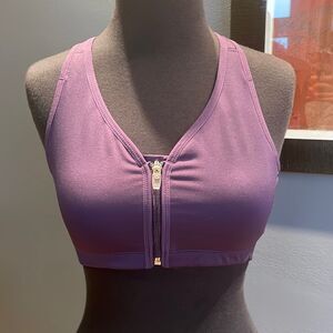 Moving Comfort grape zipper front racerback sports bra. Medium.